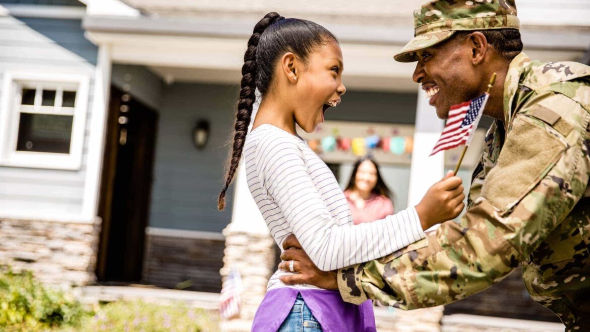 military child reunited with father 1200@2x