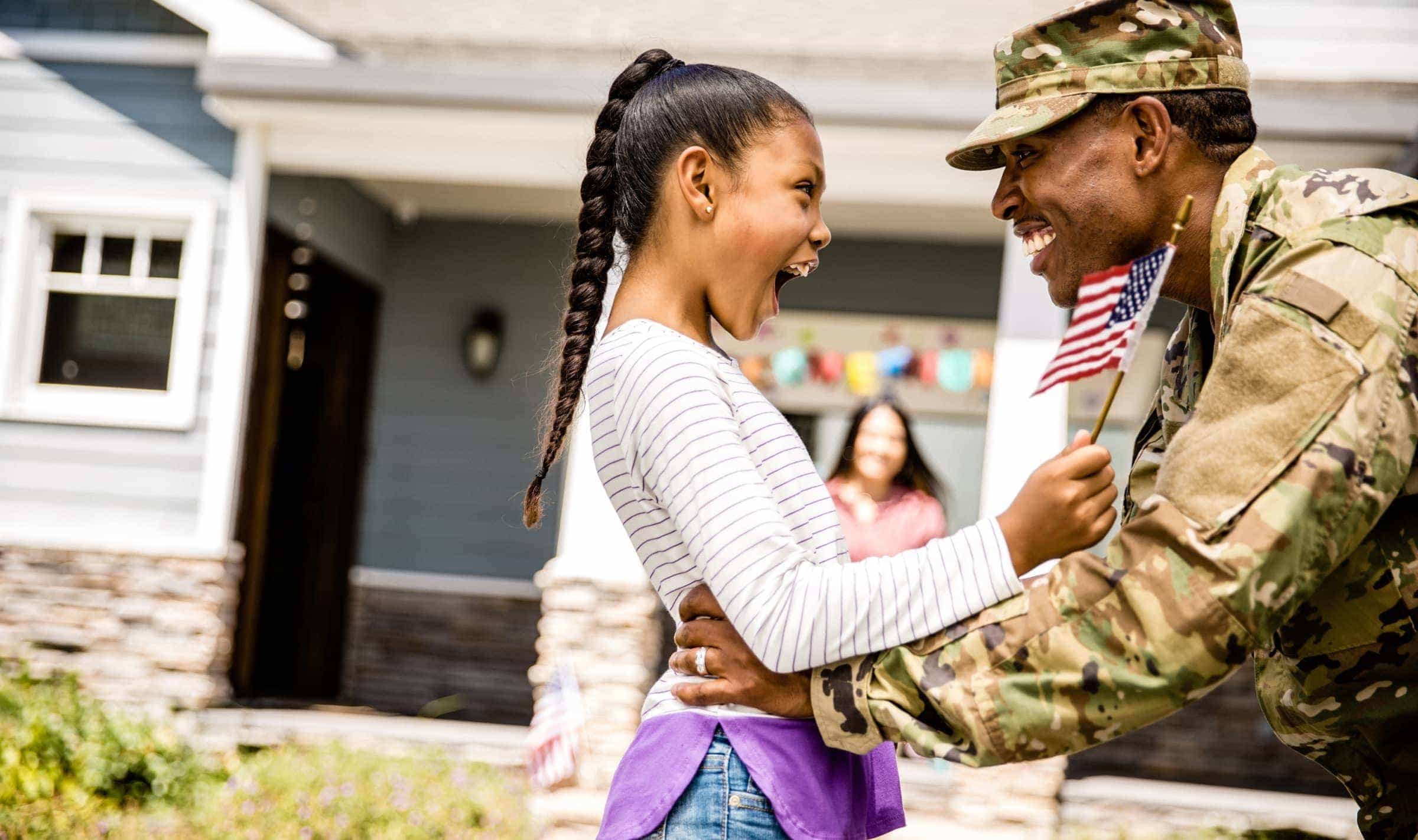 military child reunited with father